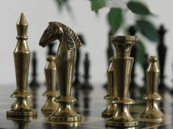 The Cobra Brass and Steel Chess Pieces