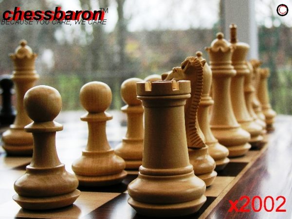 Carved Chamfered Base Ebonised Staunton Chess Set