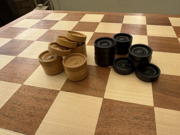Ebonized and Boxwood Set of Draught Pieces