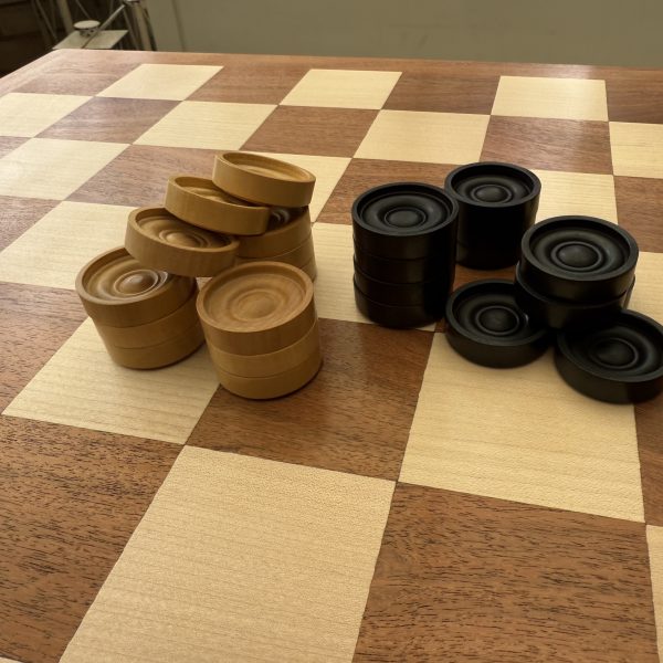 Ebonized and Boxwood Set of Draught Pieces
